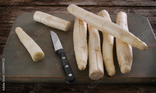 preparing fresh white asparagus spears photo