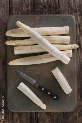 preparing fresh white asparagus spears photo