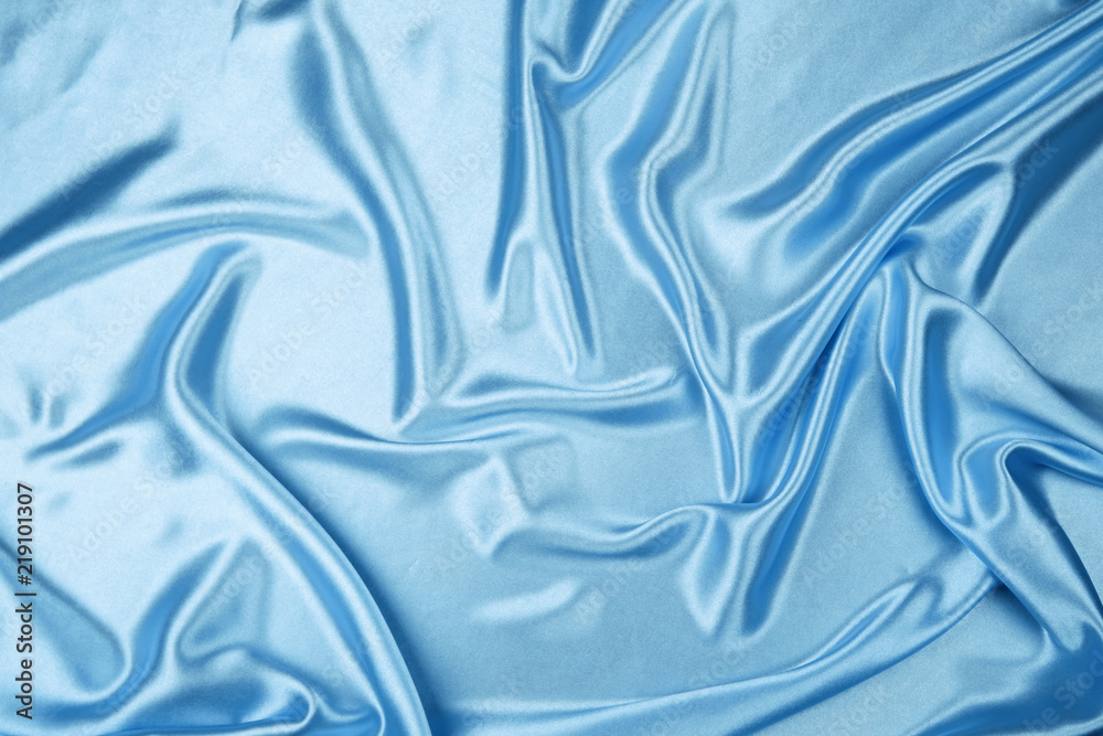 Blue luxury satin fabric texture for background Blue luxury satin fabric texture for background