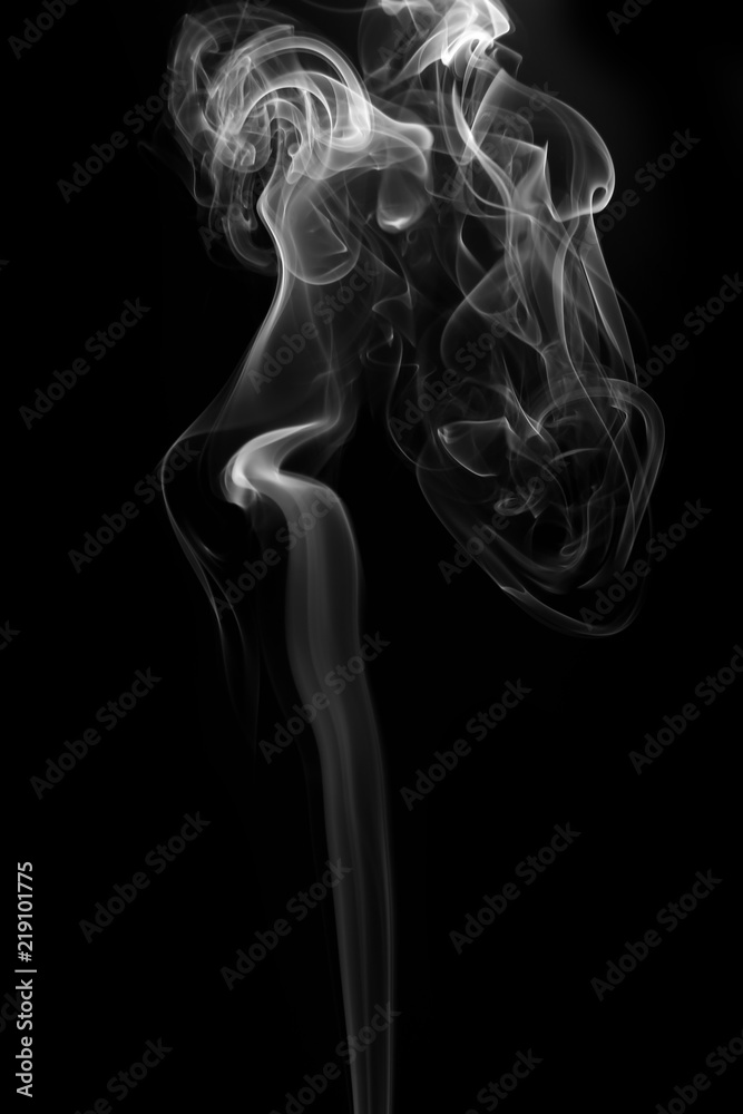 Movement of white smoke on black background