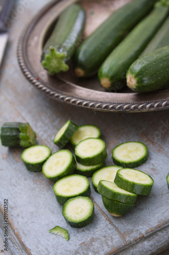 preparing baby courgette