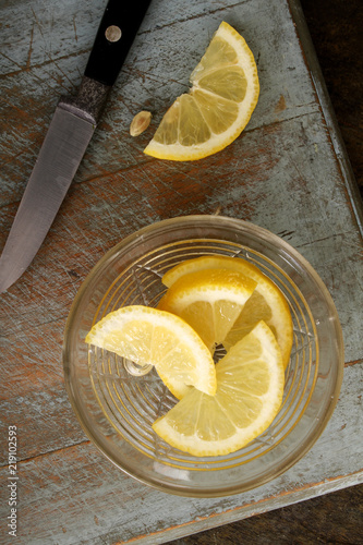 preparing sliced lemon