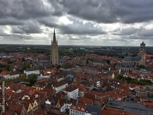 Aerial view from the belfry over bruges belgium on cloudy day with red rooftops 