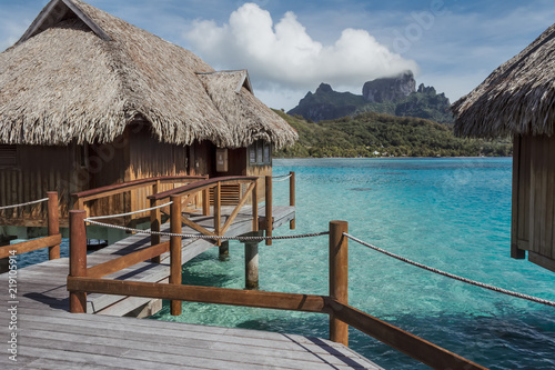 Over water bungalow and Mountain Otemanu behind in Bora Bora, French Polynesia