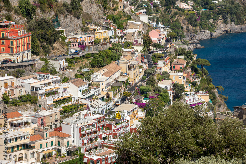Small town of Positano along Amalfi coast with its many wonderful colors and terraced houses, Campania, Italy.