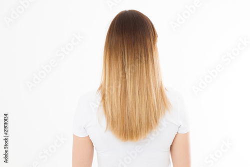 Brunette girl with blonde ombre long and smooth straight healthy hair isolated on white background. Young woman fashion hairstyle back view. Copy space. Template and blank t shirt.