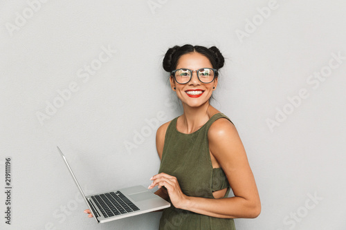 Portrait of a happy young woman isolated
