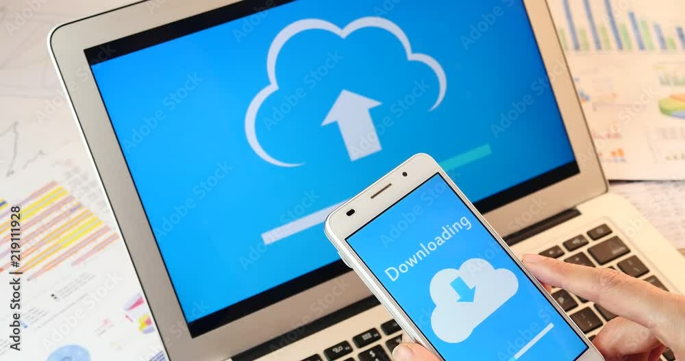 4k,upload the informative cloud on the laptop screen,Smartphone To Cloud Data Transfer.uploading progress,web tech background,financial charts on the table. 4k,upload the informative cloud on the laptop screen,Smartphone To Cloud Data Transfer.uploading progress,web tech background,financial charts on the table.