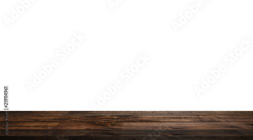 Wooden old table isolated on white background. For your product placement or montage with focus to the table top in the foreground
