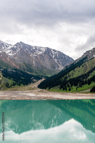 Big Almaty Lake in summer. Beautiful landscape in the mountains of Trans-Ili Alatau near Almaty city