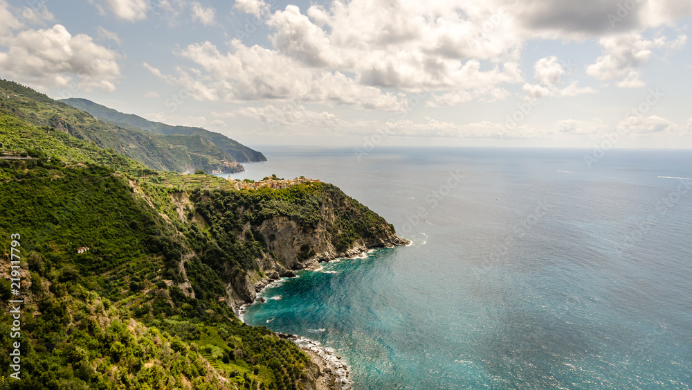 Aerial panoramic view of Corniglia fishing village in Five lands, Cinque Terre National Park, Liguria, Italy. Aerial panoramic view of Corniglia fishing village in Five lands, Cinque Terre National Park, Liguria, Italy.