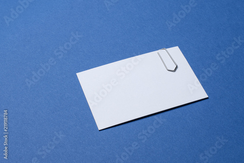 business card empty with paper clip