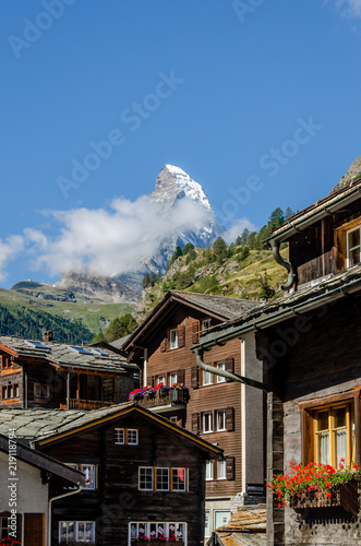 Houses in Zermatt and the top of the Matterhorn