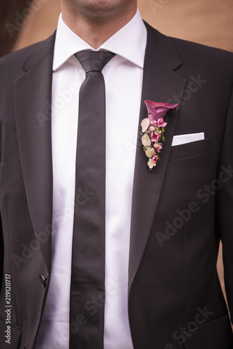 Groom in a jacket. The morning of the groom, bridegroom's fees. Close up