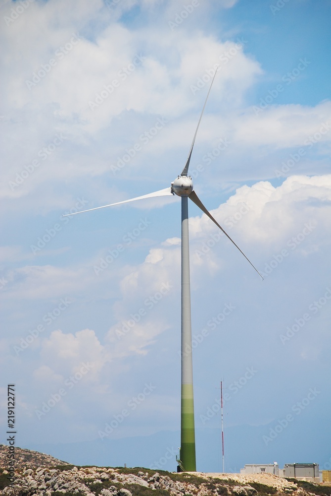 The large wind turbine on the coast of the Greek island of Tilos on June 18, 2018. The island aims to become self sufficient in power through wind and solar panel technology. The large wind turbine on the coast of the Greek island of Tilos on June 18, 2018. The island aims to become self sufficient in power through wind and solar panel technology.