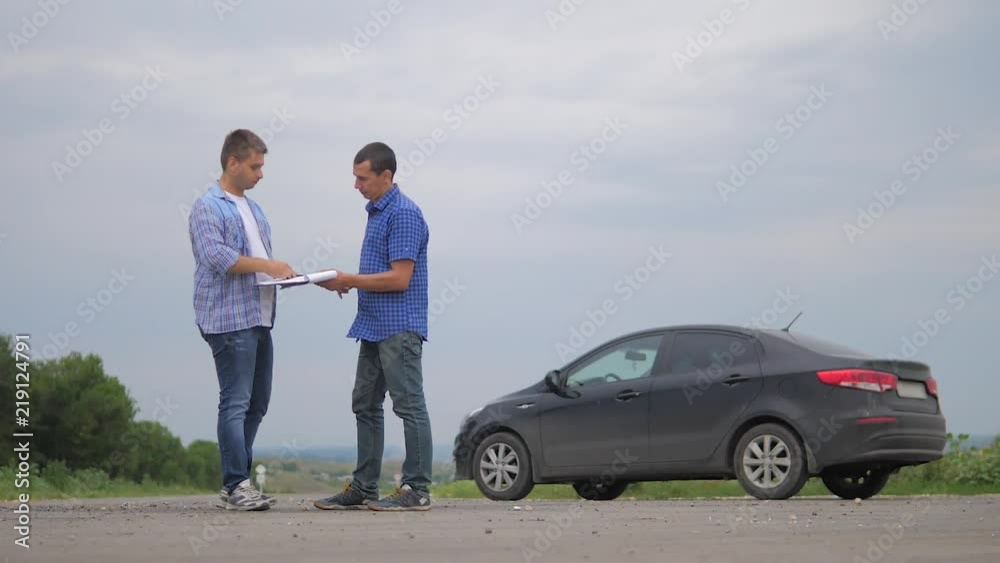 two men make deal. man seller driver makes car the auto insurance slow motion video sale sells used cars. Buying rent a car . man car insurance sale of used cars concept lifestyle. man test drive car two men make deal. man seller driver makes car the auto insurance slow motion video sale sells used cars. Buying rent a car . man car insurance sale of used cars concept lifestyle. man test drive car