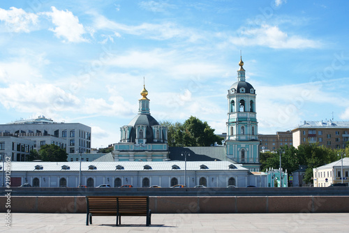 A bench with a view of the Raushskaya embankment. Russia Moscow. August, 2018. photo