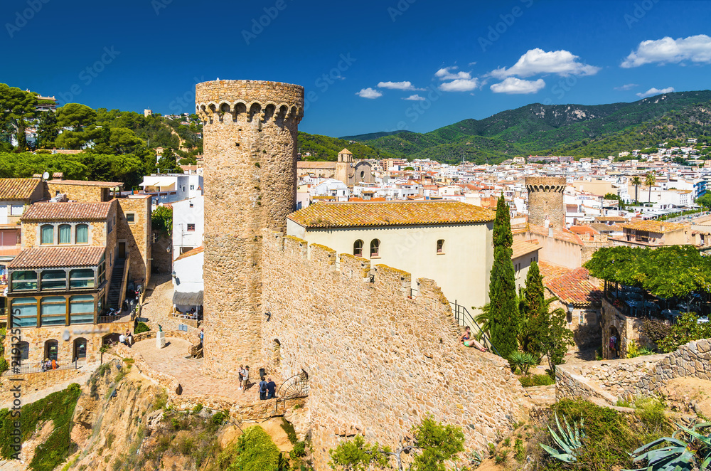 Sunny view of fortress Tossa de Mar at the coast of  Mediterranean sea, Girona province, Spain.