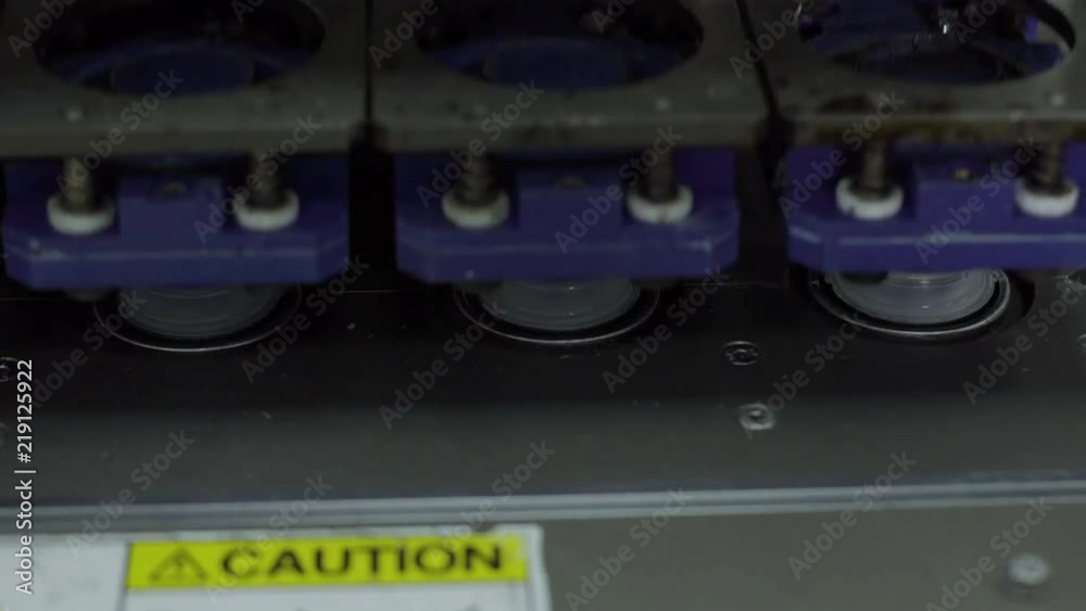 installation of caps on sterilized plastic bottles with medicine on the conveyor of the plant for the production of medical products and medicines with blow fill seal tecnology