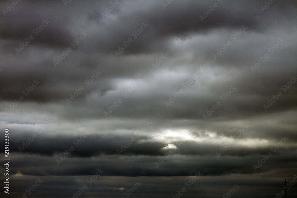 Sky, rain clouds background. Cumulonimbus in the dark sky. Thunderstorm Sky, rain clouds background. Cumulonimbus in the dark sky. Thunderstorm