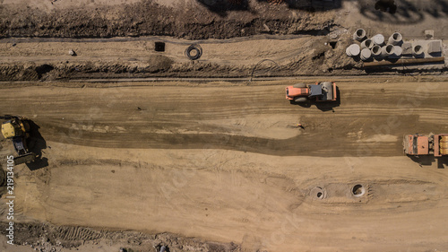 Wallpaper Mural Aerial construction site with machinery. Top down view of city building site. Torontodigital.ca