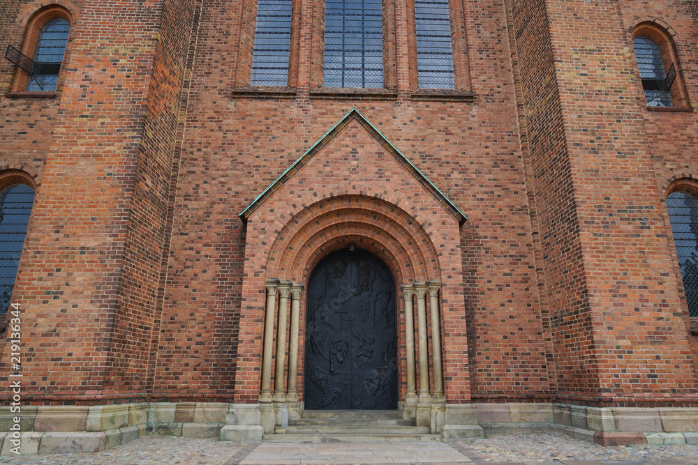 Roskilde Cathedral is a cathedral of the Lutheran Church of Denmark. The first Gothic cathedral to be built of brick, it encouraged the spread of the Brick Gothic style throughout Northern Europe