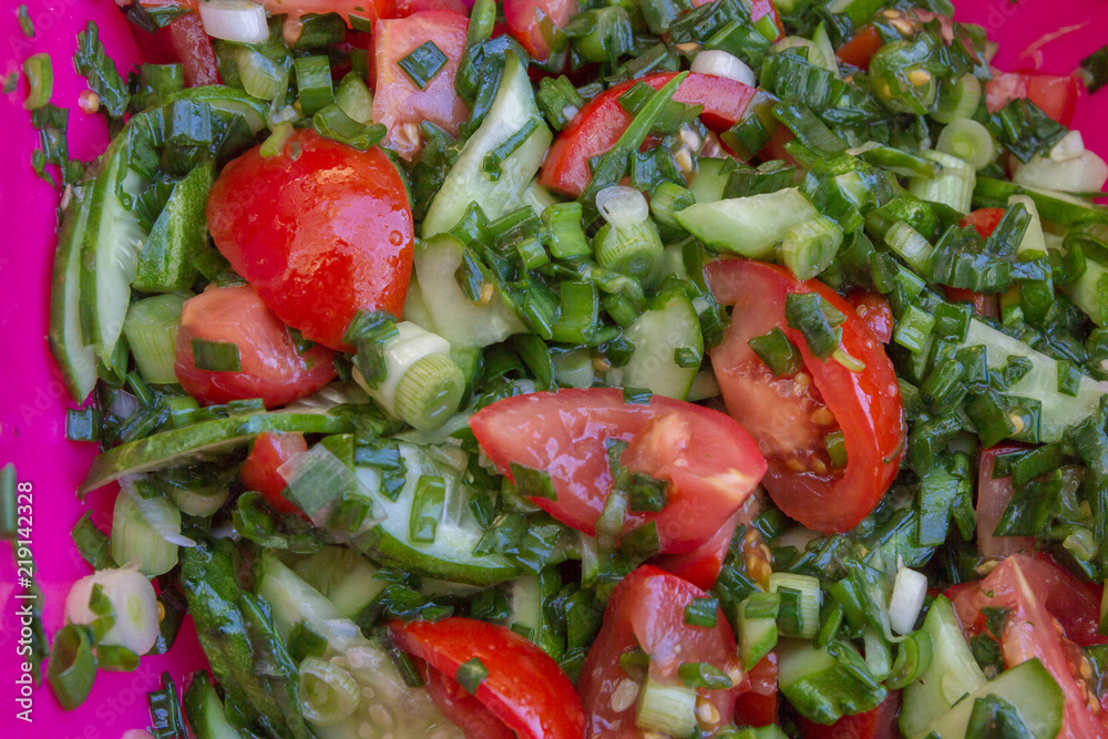 Chopped fresh vegetable salad of tomatoes, cucumbers, green onions Chopped fresh vegetable salad of tomatoes, cucumbers, green onions