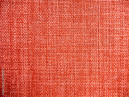 Texture of red linen or nylon fabric texture.