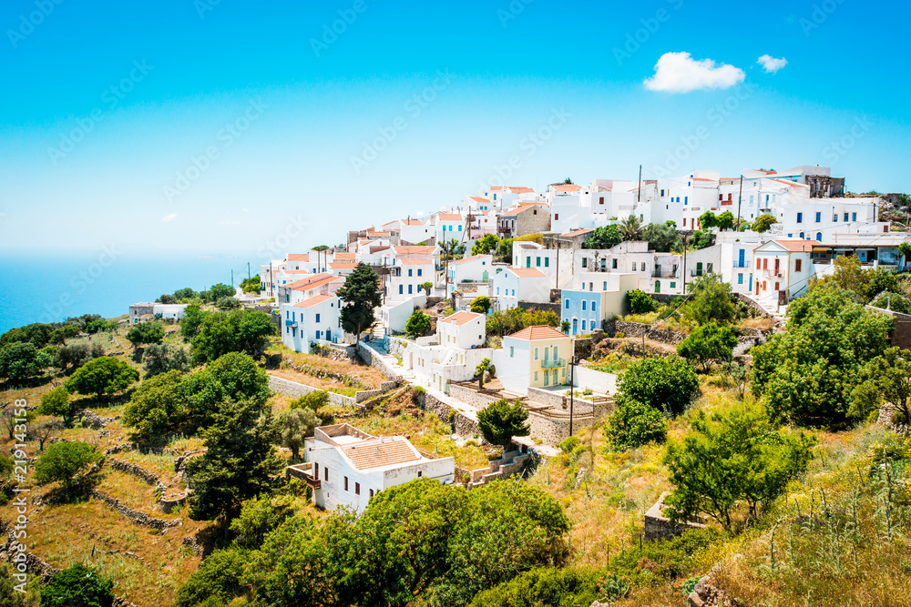 Greek village with white houses and red roofs, Nikia on Nisyros Island, Greece