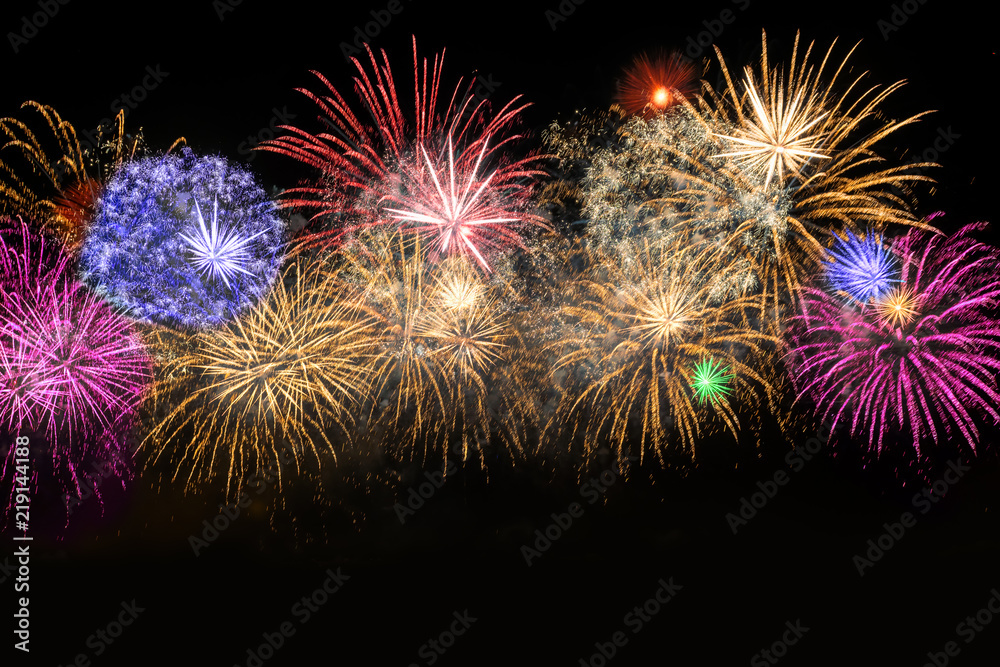 Happy New Year celebration colorful fireworks. New year and holidays concept.