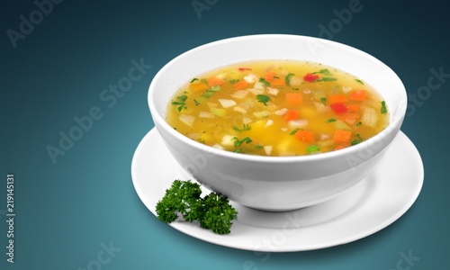 Bowl of delicious vegetables soup on  table
