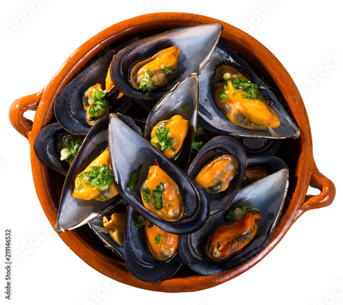 Mussels with herbs on plate
