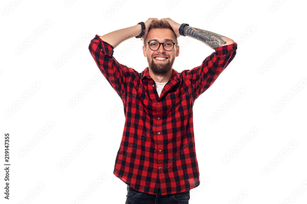 Handsome man model studio portrait. Boy casual style, trendy hipster in checkered shirt look with cool hairstyle Handsome man model studio portrait. Boy casual style, trendy hipster in checkered shirt look with cool hairstyle