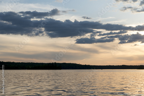 Clouds over a lake at dusk, Lake of The Woods, Ontario, Canada