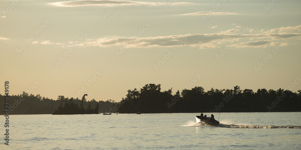 Boat moving in a lake, Lake of The Woods, Ontario, Canada