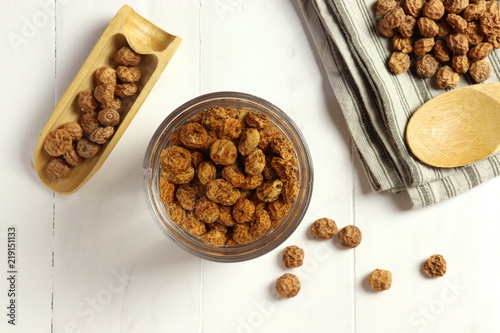 Soaking tigernuts before preparing horchata, non dairy milk typical for Valencia, top view photo