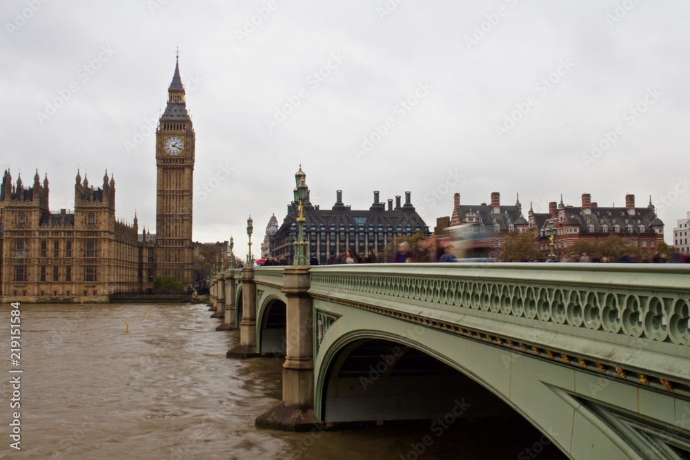 Tourists Walk Past Big Ben in London Across the Thames