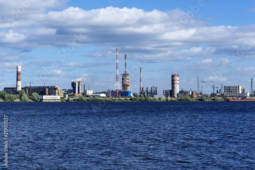 industrial zone on the coast behind a vast water area, a general view