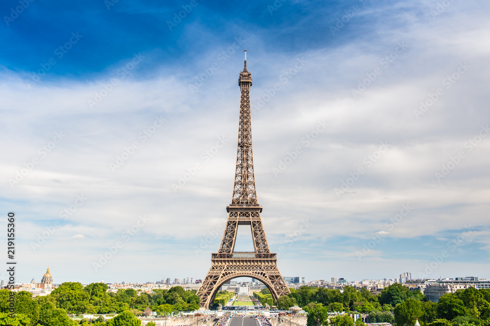 PARIS, France - JUNE 23, 2018 : the Eiffel Tower on Summer, 2018 in Paris. Illuminated Eiffel tower is the most popular travel place and global cultural icon of the France and the world.