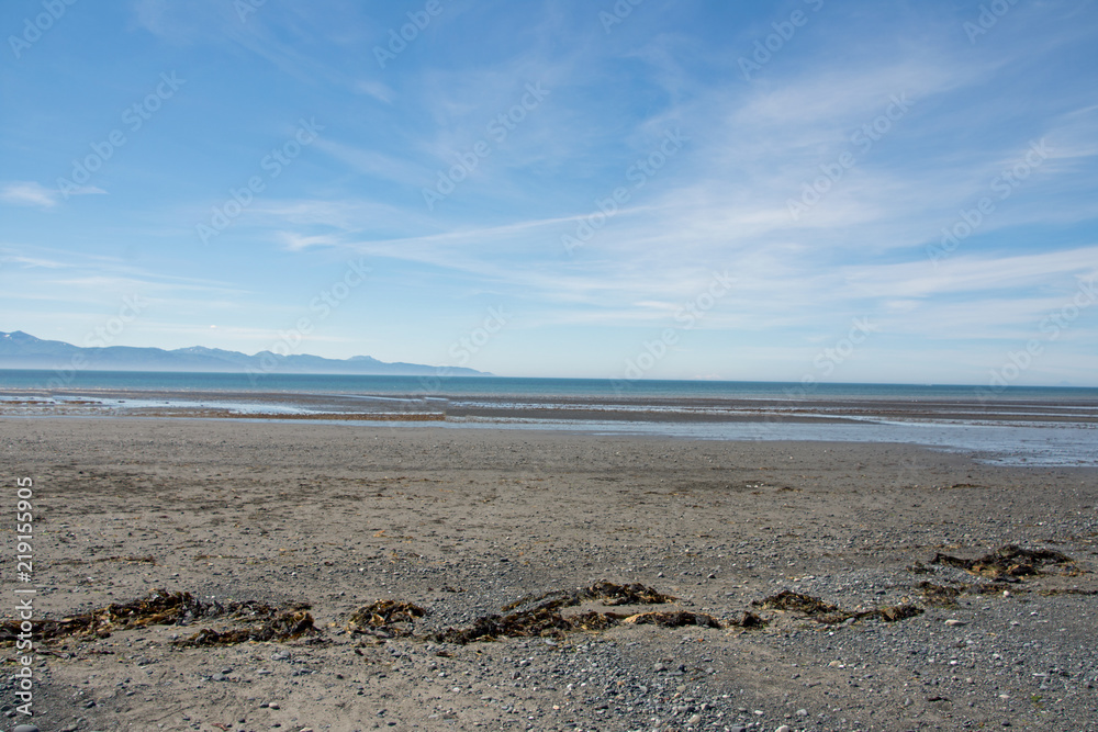 Several volcanic peaks across Cook Inlet in Homer Alaska Several volcanic peaks across Cook Inlet in Homer Alaska