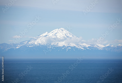 Several volcanic peaks across Cook Inlet in Homer Alaska