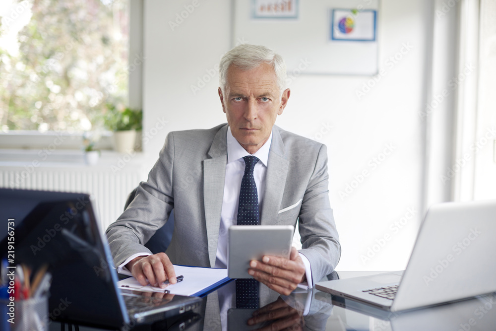 Businessman working in the office Businessman working in the office