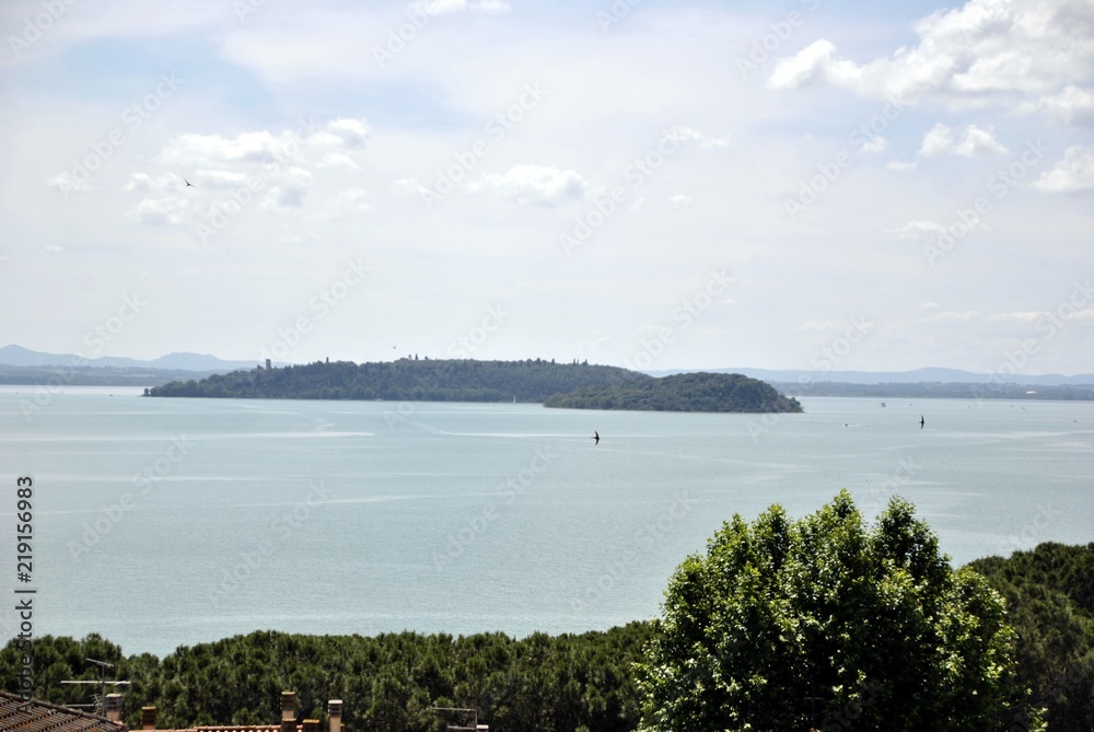 italian lake Trasimeno and village view