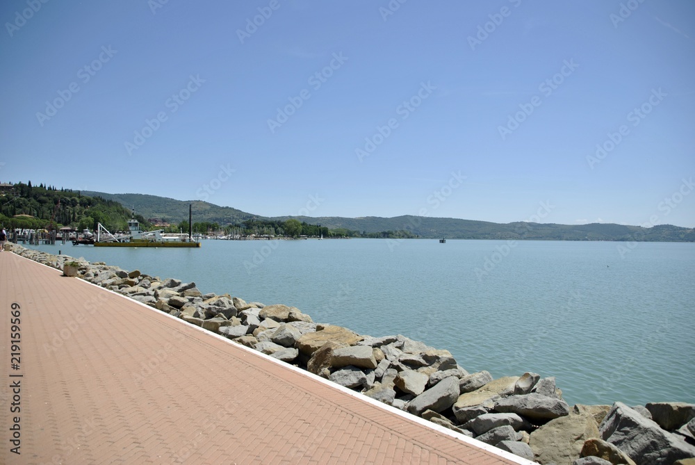 Fototapeta premium italian lake Trasimeno and village view