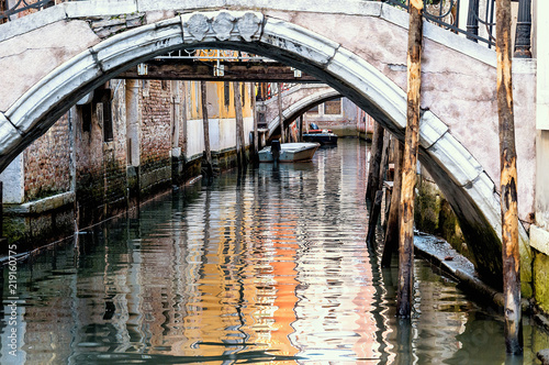 Little canal in the medieval center of Venice