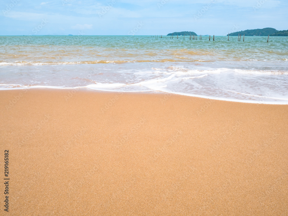 close up sand ground floor ,water sea beach , island with cloudy blue sky and horizon close up sand ground floor ,water sea beach , island with cloudy blue sky and horizon