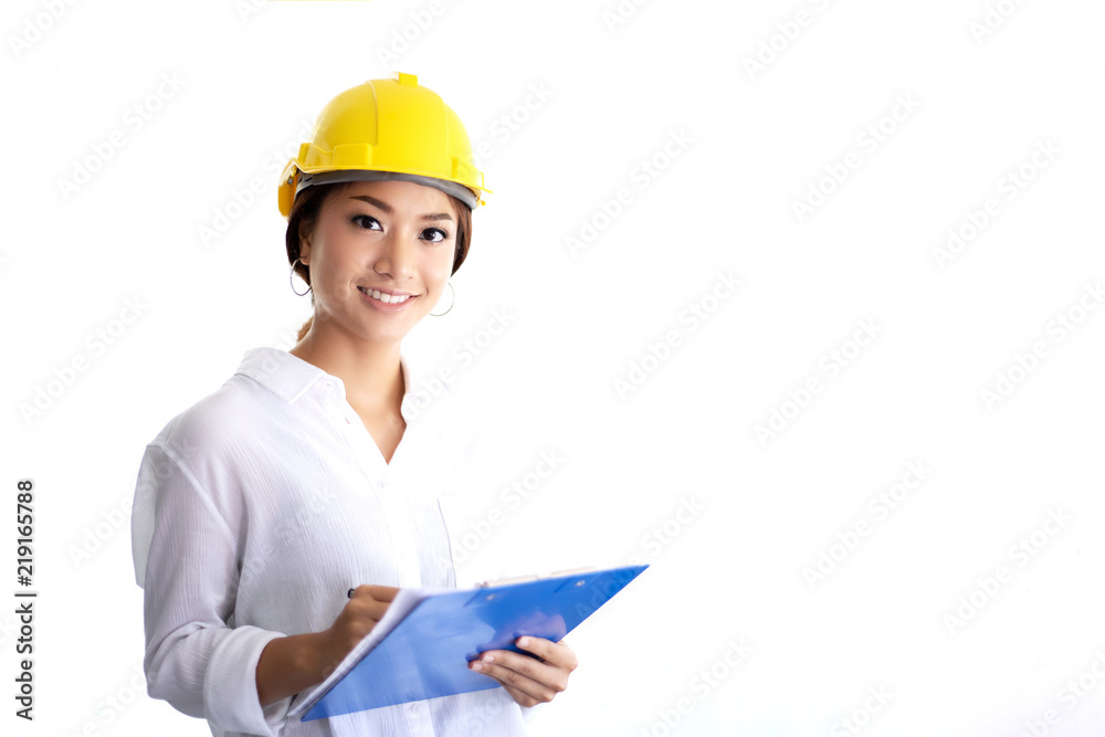 Asian women engineering inspecting and working and holding blueprints at office Asian women engineering inspecting and working and holding blueprints at office