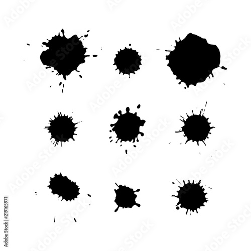 Black ink blots isolated on white background. Splashes texture.