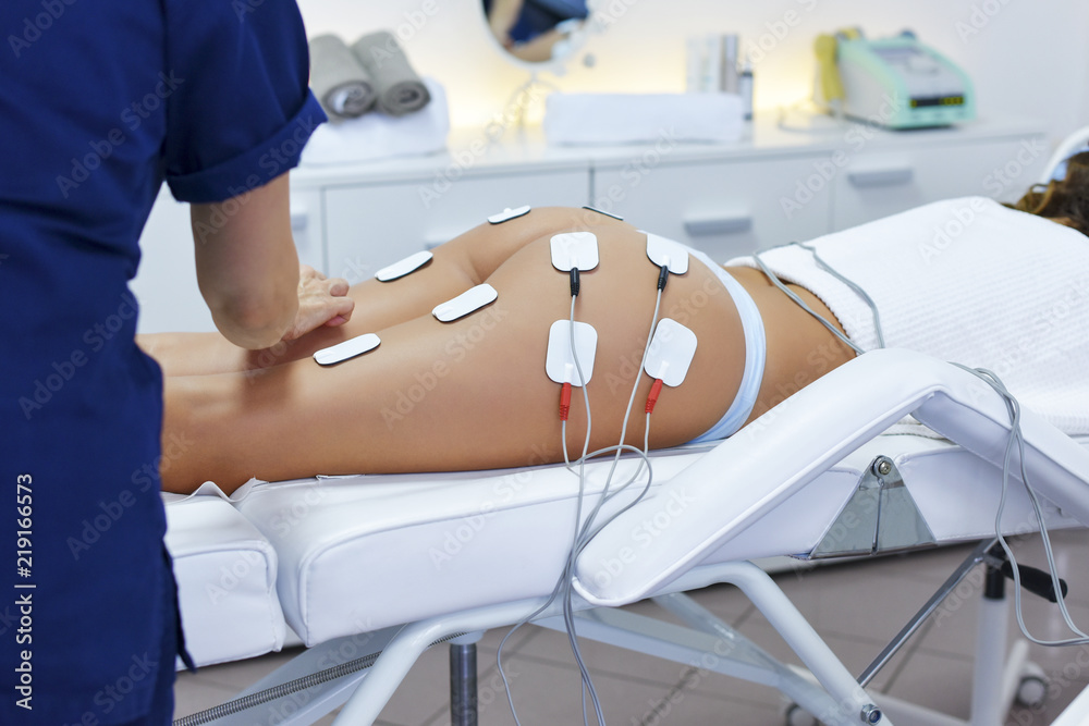 Naklejka premium Treatment with electro stimulation