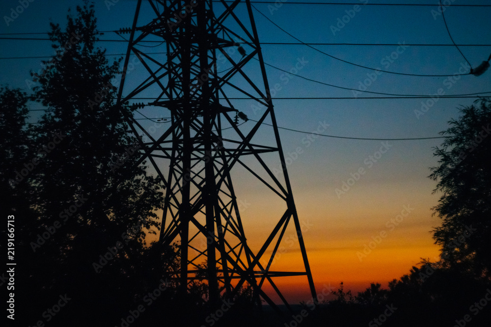 electric tower at sunset